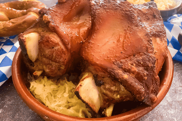 MINI PORK KNUCKLE EMAIL (4) Pork knuckle on bed of Sauerkraut