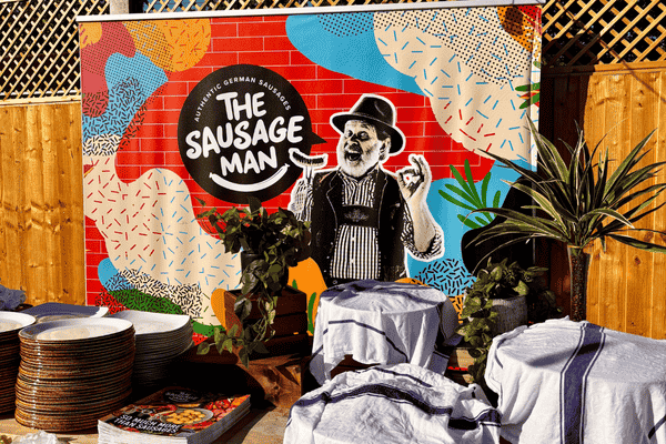 The Sausage Man banner in an event